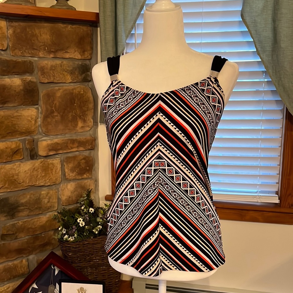 White House black market top with metal accents